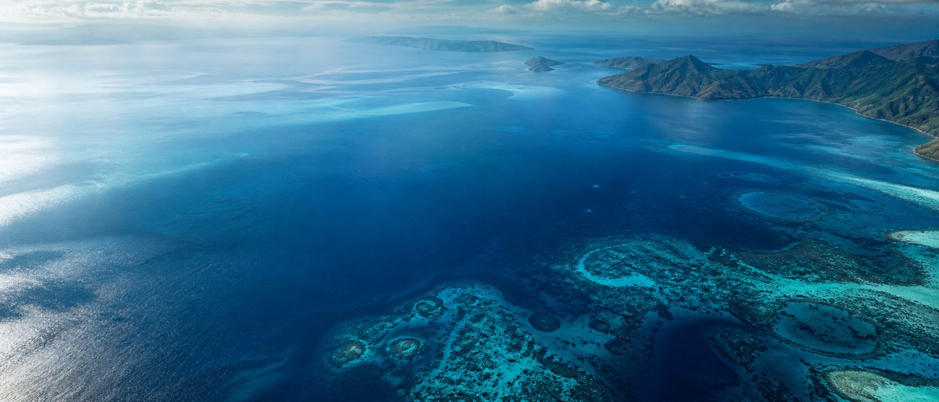 Aerial view of Pacific reef and islands